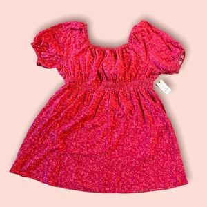 Dress with tie in the back.